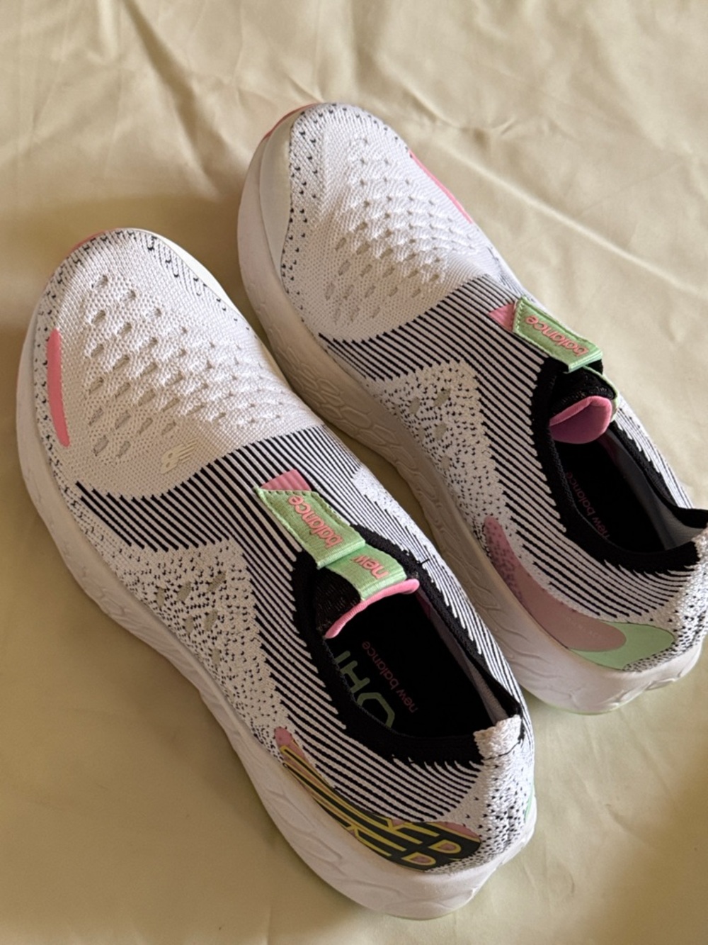 New Balance White Knit Slip-On Sneakers with Pink Accents